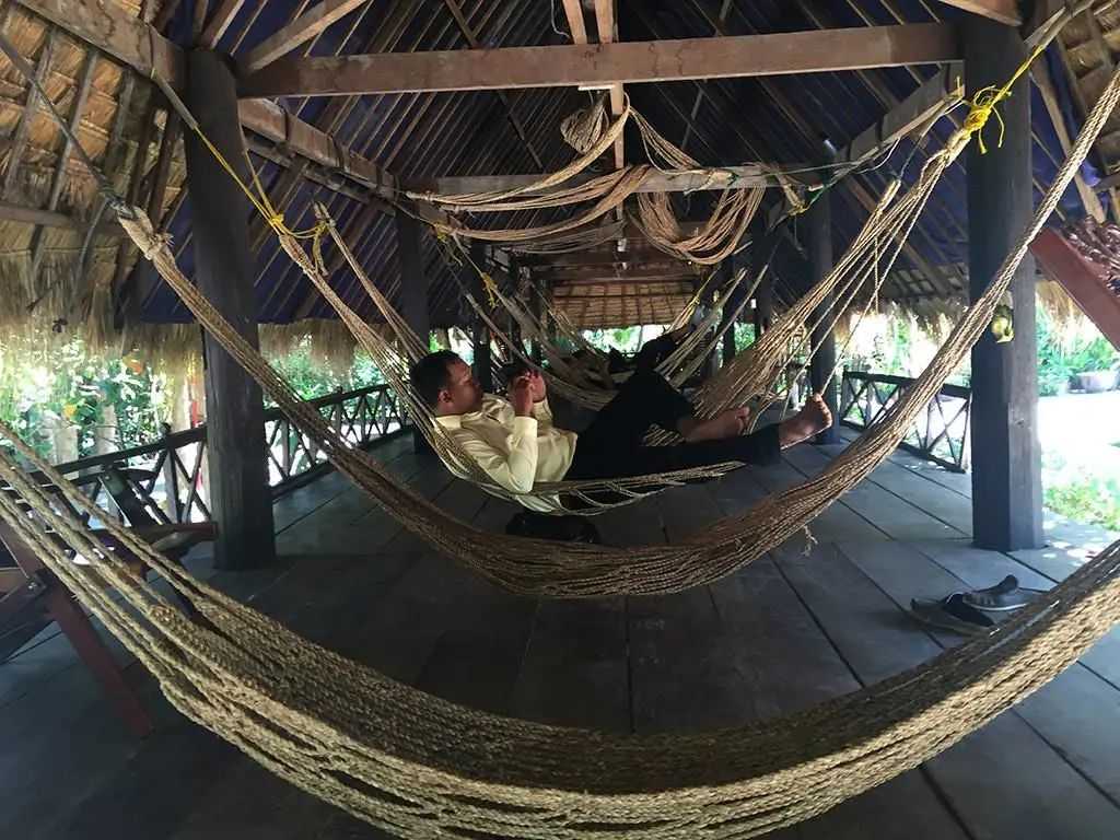 Cambodia's Unusual Sleeping Tradition: Hammocks Suspended Outside Homes